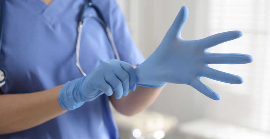 Medical gloves being worn